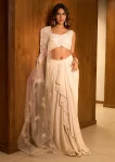 BEIGE EMBROIDERED BLOUSE WITH RUFFLE DRAPE SKIRT AND A ONE-SHOULDER FEATHER CAPE